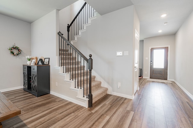 333 Mohan Dr, Royse City, TX 75189 - foyer featuring wood finished floors, stairs, baseboards, and recessed lighting