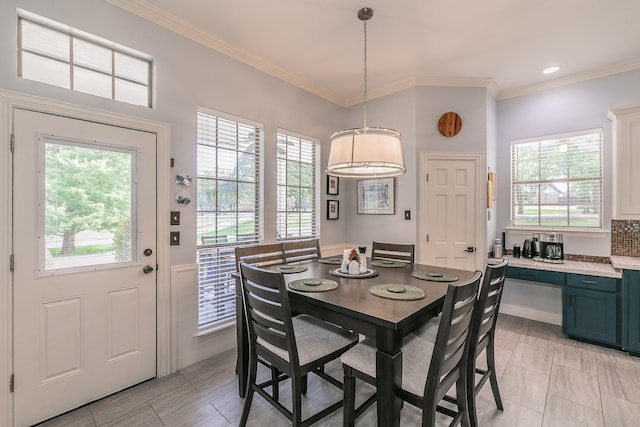 1220 Mount Gilead Rd, Keller, TX 76262 - dining area with plenty of natural light and crown molding