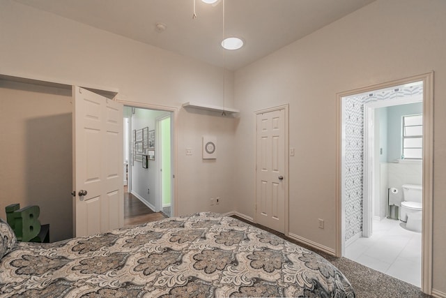 1220 Mount Gilead Rd, Keller, TX 76262 - bedroom featuring connected bathroom, baseboards, and tile patterned floors