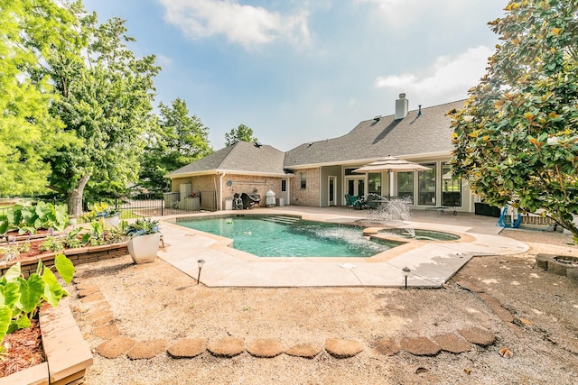 1220 Mount Gilead Rd, Keller, TX 76262 - view of swimming pool with a patio area and a pool with connected hot tub