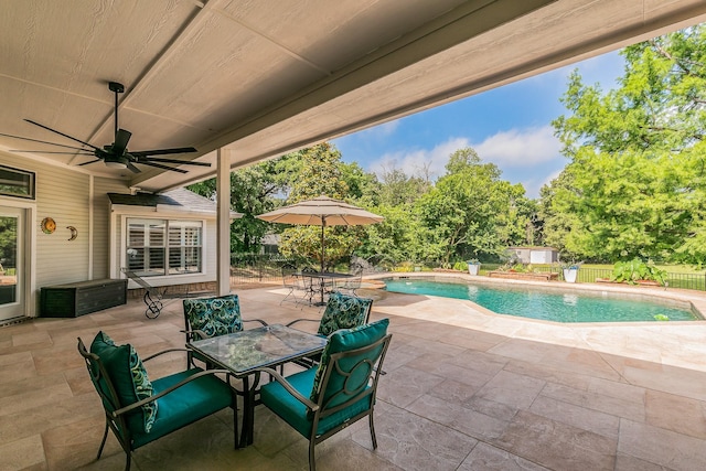 1220 Mount Gilead Rd, Keller, TX 76262 - fenced backyard featuring a patio, outdoor dining area, and ceiling fan