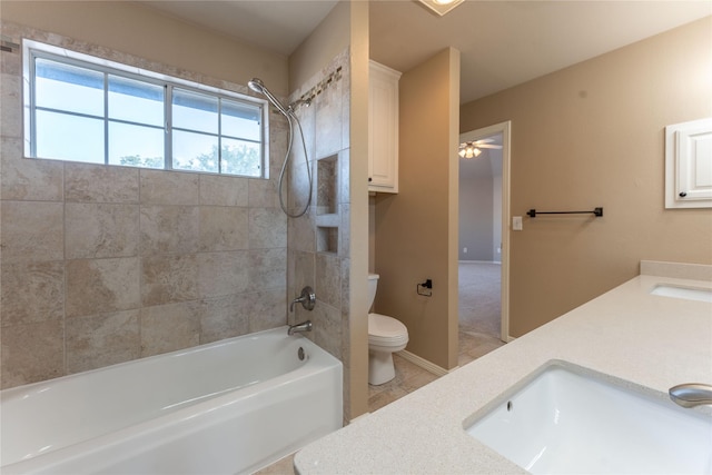 209 Timber Lake Dr, Southlake, TX 76092 - bathroom with toilet, tub / shower combination, double vanity, a ceiling fan, and baseboards