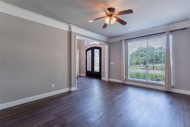 209 Timber Lake Dr, Southlake, TX 76092 - entrance foyer featuring ornamental molding, baseboards, dark wood-style floors, a ceiling fan, and arched walkways