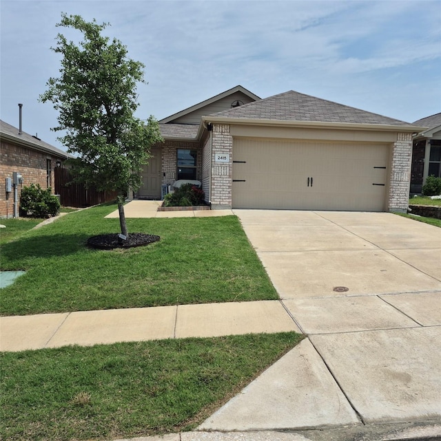 2415 Russell St, Crandall, TX 75114 - ranch-style house featuring brick siding, an attached garage, and driveway