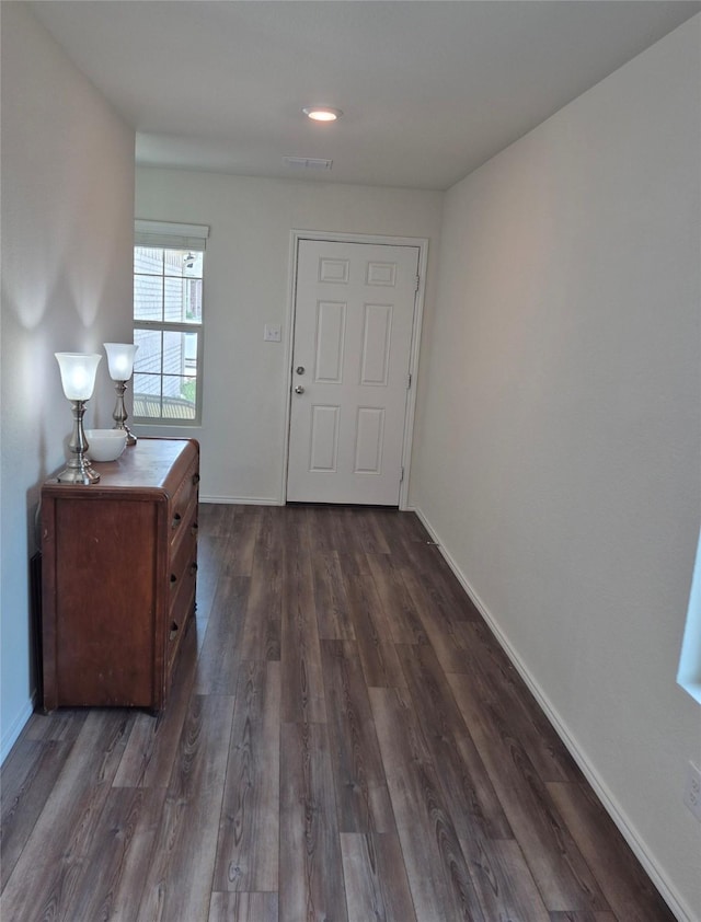 2415 Russell St, Crandall, TX 75114 - entrance foyer featuring dark wood-style flooring and baseboards