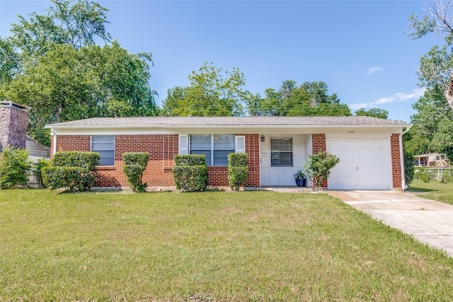 4833 Harper Dr, Mesquite, TX 75150 - ranch-style house featuring a garage, driveway, a front lawn, and brick siding