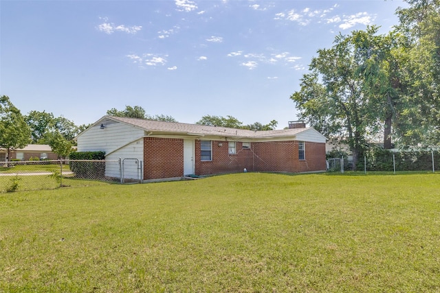 4833 Harper Dr, Mesquite, TX 75150 - rear view of property featuring brick siding and a garage