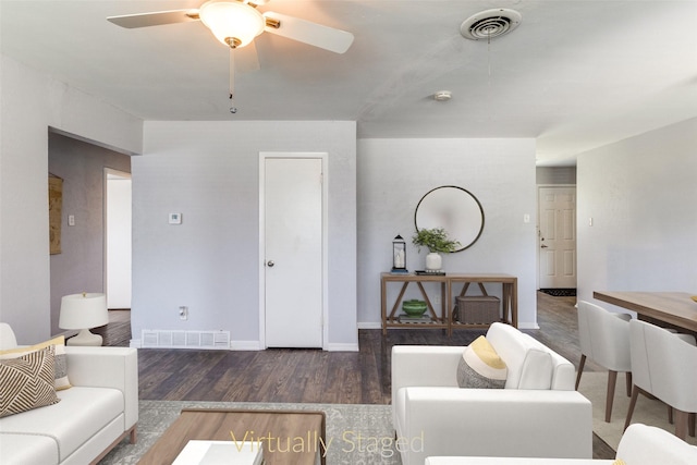 4833 Harper Dr, Mesquite, TX 75150 - living area featuring wood finished floors, ceiling fan, and baseboards