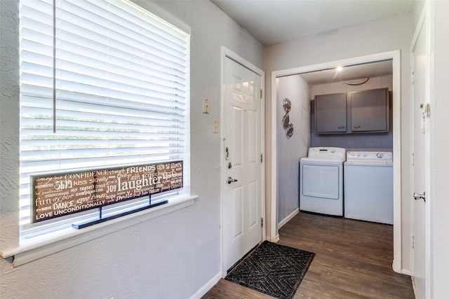 4833 Harper Dr, Mesquite, TX 75150 - clothes washing area featuring independent washer and dryer, dark wood-style floors, and cabinet space