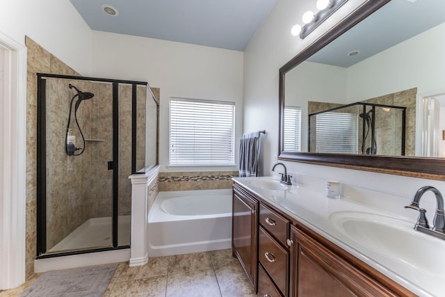 6606 Morning Dew Dr, Midlothian, TX 76065 - bathroom featuring a shower stall, a bath, tile patterned floors, and double vanity