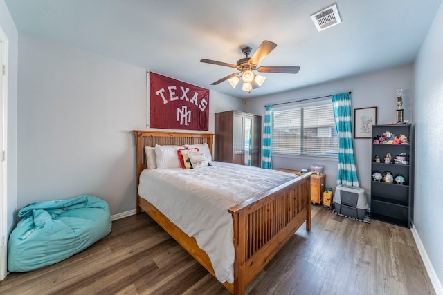 6606 Morning Dew Dr, Midlothian, TX 76065 - bedroom featuring wood finished floors, baseboards, and a ceiling fan
