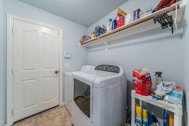 6606 Morning Dew Dr, Midlothian, TX 76065 - washroom with washer and dryer and light tile patterned flooring