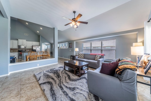 6606 Morning Dew Dr, Midlothian, TX 76065 - living area with ceiling fan, light tile patterned floors, recessed lighting, high vaulted ceiling, and arched walkways