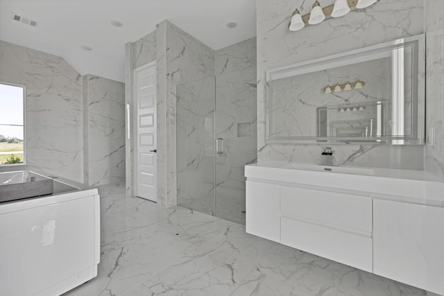 14908 S County Line Rd, Justin, TX 76247 - bathroom with washer / dryer, marble tiled flooring, vanity, a marble finish shower, and stone wall