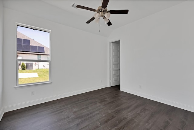 14908 S County Line Rd, Justin, TX 76247 - spare room with dark wood-type flooring, baseboards, ceiling fan, and vaulted ceiling