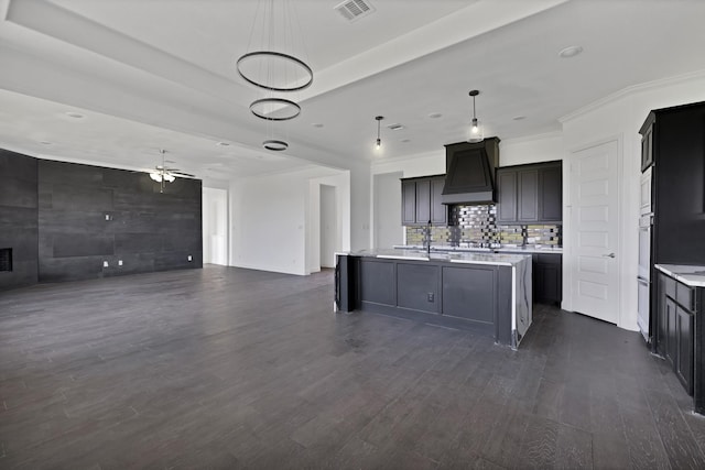 14908 S County Line Rd, Justin, TX 76247 - kitchen featuring open floor plan, light countertops, dark wood-style floors, ceiling fan, and ornamental molding