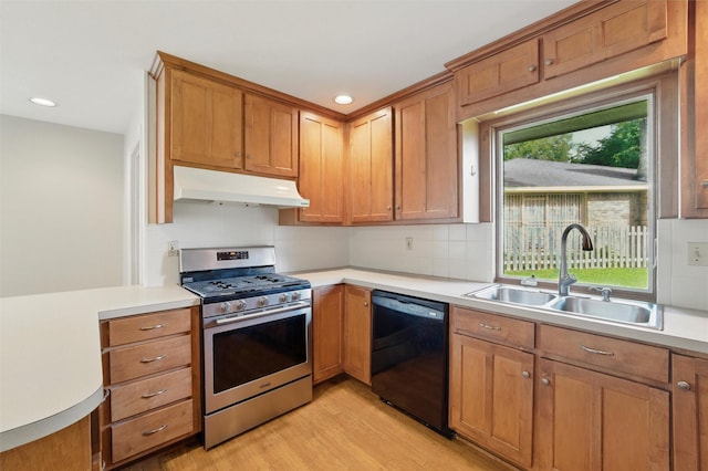 815 Middle Run, Duncanville, TX 75137 - kitchen featuring under cabinet range hood, stainless steel gas range oven, black dishwasher, a sink, and light countertops