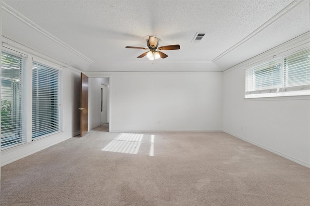 815 Middle Run, Duncanville, TX 75137 - spare room featuring ornamental molding, a ceiling fan, light colored carpet, and a textured ceiling