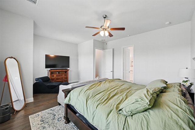 7205 York St, North Richland Hills, TX 76180 - bedroom featuring dark wood-style flooring, baseboards, ceiling fan, and ensuite bathroom