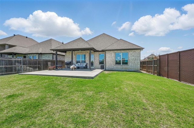 7205 York St, North Richland Hills, TX 76180 - back of property featuring a patio area, brick siding, and roof with shingles