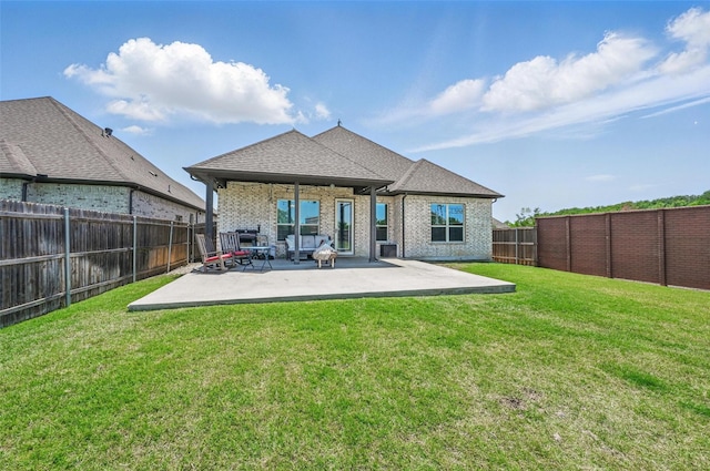 7205 York St, North Richland Hills, TX 76180 - rear view of property with a patio, brick siding, and a shingled roof