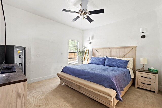 522 Helena St, Dallas, TX 75217 - bedroom featuring light colored carpet, ceiling fan, and baseboards