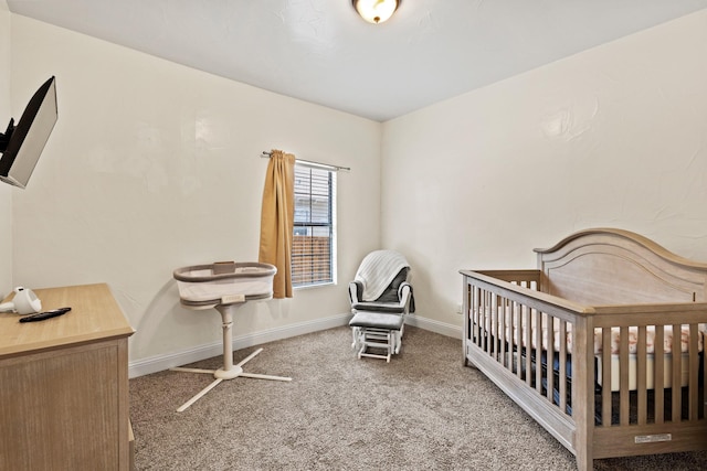 522 Helena St, Dallas, TX 75217 - carpeted bedroom featuring baseboards and a crib
