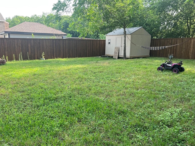 522 Helena St, Dallas, TX 75217 - view of yard with a storage unit and an outbuilding