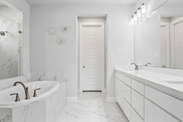 2229 Boboli Ct, Celina, TX 75009 - bathroom featuring a garden tub, a marble finish shower, marble finish floors, double vanity, and baseboards