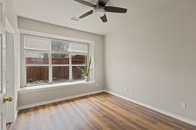 2671 Marshall Dr, Frisco, TX 75033 - unfurnished room featuring baseboards, a ceiling fan, and wood finished floors