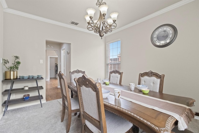 2671 Marshall Dr, Frisco, TX 75033 - dining room featuring a chandelier, crown molding, baseboards, and light colored carpet