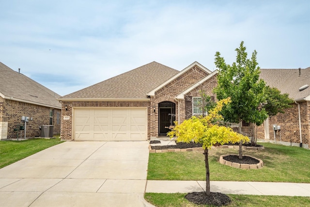 6620 Roaring Crk, Denton, TX 76226 - view of front of house featuring brick siding, a garage, concrete driveway, and a shingled roof