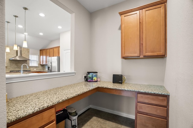 6620 Roaring Crk, Denton, TX 76226 - office area featuring built in desk, tile patterned flooring, vaulted ceiling, recessed lighting, and a sink