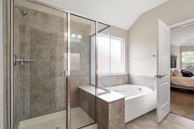 6620 Roaring Crk, Denton, TX 76226 - ensuite bathroom featuring a shower stall, lofted ceiling, a bath, and tile patterned floors