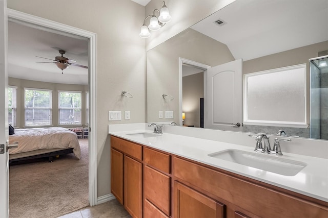 6620 Roaring Crk, Denton, TX 76226 - bathroom with connected bathroom, a ceiling fan, double vanity, tile patterned flooring, and lofted ceiling