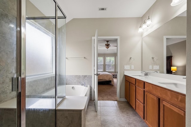 6620 Roaring Crk, Denton, TX 76226 - ensuite bathroom with a ceiling fan, a garden tub, a shower stall, double vanity, and tile patterned flooring
