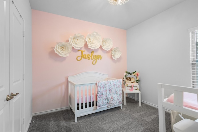 2619 Pinckney Ct, Forney, TX 75126 - carpeted bedroom with a crib and baseboards