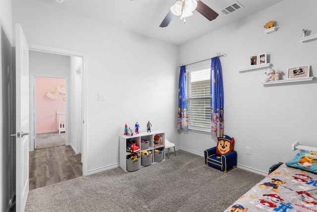 2619 Pinckney Ct, Forney, TX 75126 - carpeted bedroom featuring baseboards and a ceiling fan