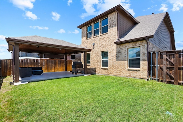 2619 Pinckney Ct, Forney, TX 75126 - rear view of property with a patio, brick siding, roof with shingles, and a gate