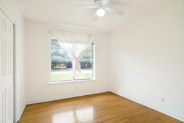 4805 Ira St, Haltom City, TX 76117 - empty room featuring light wood-type flooring, baseboards, and ceiling fan