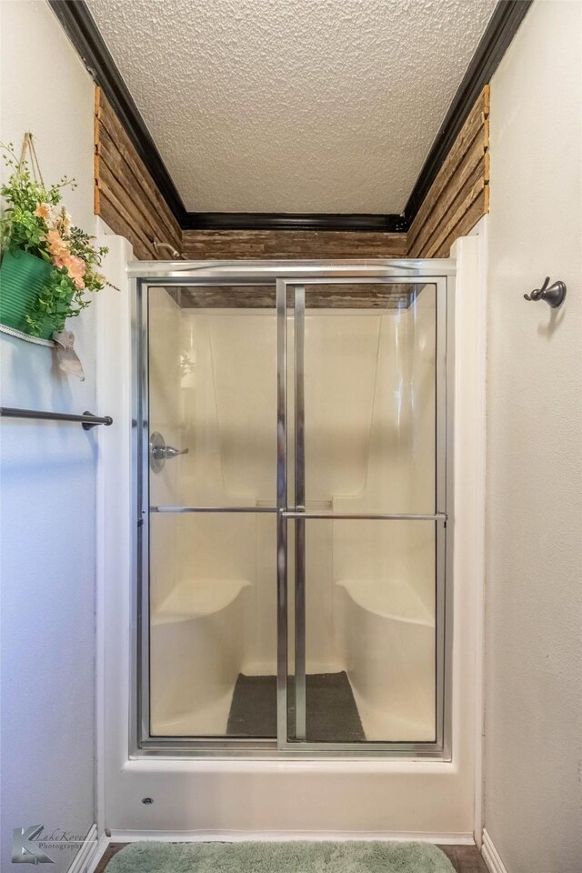 225 Field St, Clyde, TX 79510 - full bath featuring a textured ceiling and a shower stall