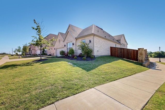 2517 Plum Tree Way, Mckinney, TX 75071 - view of property exterior with a garage and brick siding