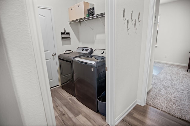 8213 Smokey Creek Pass, Fort Worth, TX 76179 - laundry room featuring independent washer and dryer, wood finished floors, and baseboards
