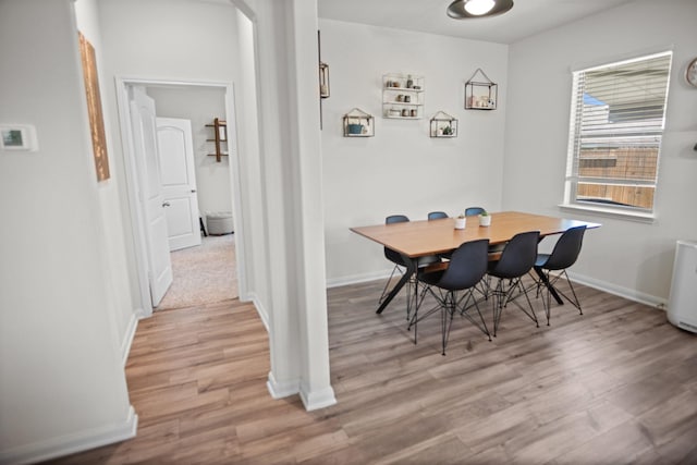 8213 Smokey Creek Pass, Fort Worth, TX 76179 - dining area featuring light wood-style flooring and baseboards