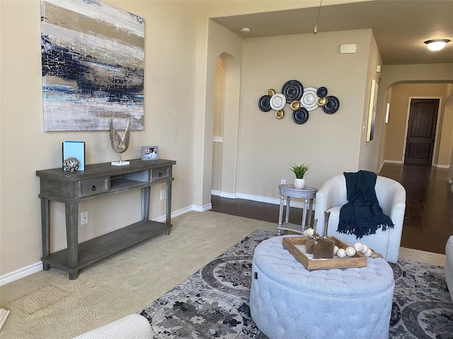 8740 Running River Ln, Fort Worth, TX 76131 - living area featuring arched walkways, carpet flooring, and baseboards
