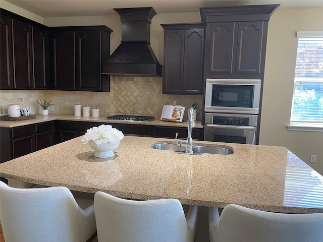 8740 Running River Ln, Fort Worth, TX 76131 - kitchen with stainless steel appliances, custom range hood, a sink, and healthy amount of natural light