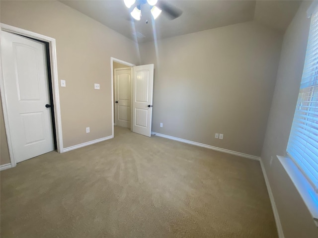 8740 Running River Ln, Fort Worth, TX 76131 - unfurnished bedroom with light colored carpet, baseboards, and ceiling fan