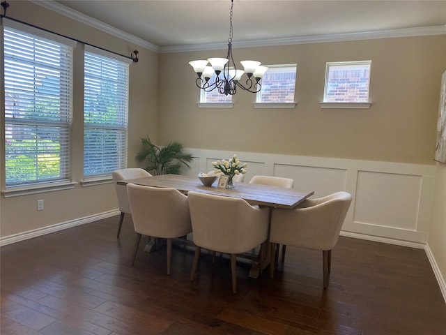 8740 Running River Ln, Fort Worth, TX 76131 - dining area featuring a chandelier, dark wood-style flooring, healthy amount of natural light, ornamental molding, and wainscoting