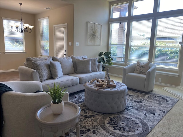8740 Running River Ln, Fort Worth, TX 76131 - carpeted living room with a chandelier and baseboards