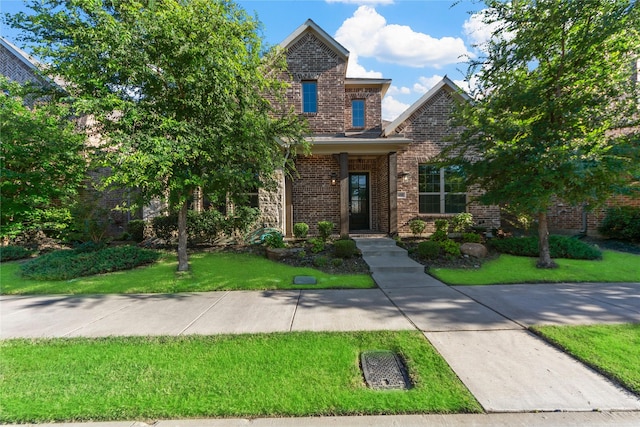 1608 Coventry Ct, Farmers Branch, TX 75234 - traditional home featuring brick siding and a front lawn